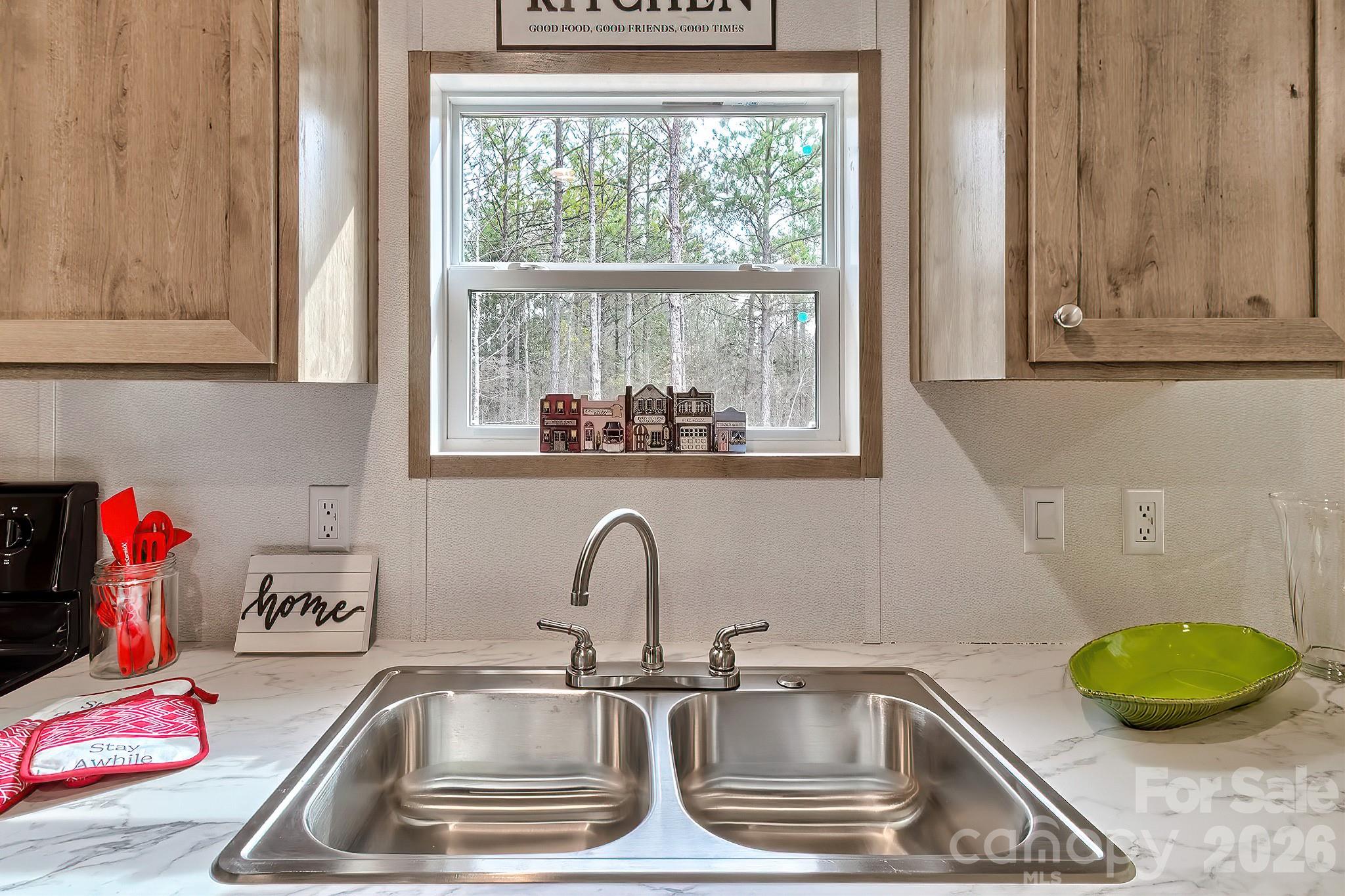 299 Ned Williams Road Kershaw, SC 29067 - Photo 29 of 43 a kitchen with a sink and a window