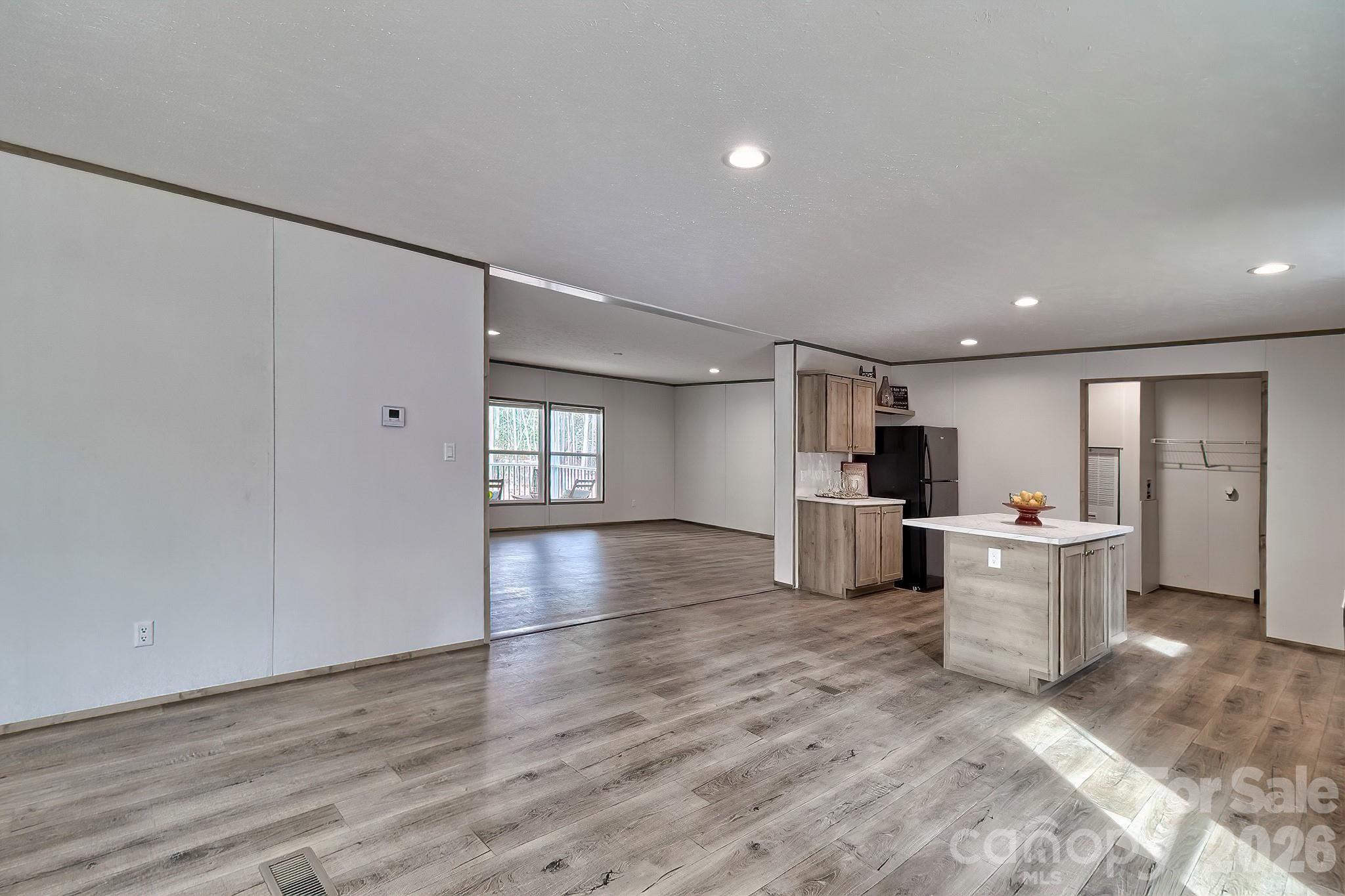 299 Ned Williams Road Kershaw, SC 29067 - Photo 33 of 43 a kitchen with stainless steel appliances a refrigerator and a stove top oven