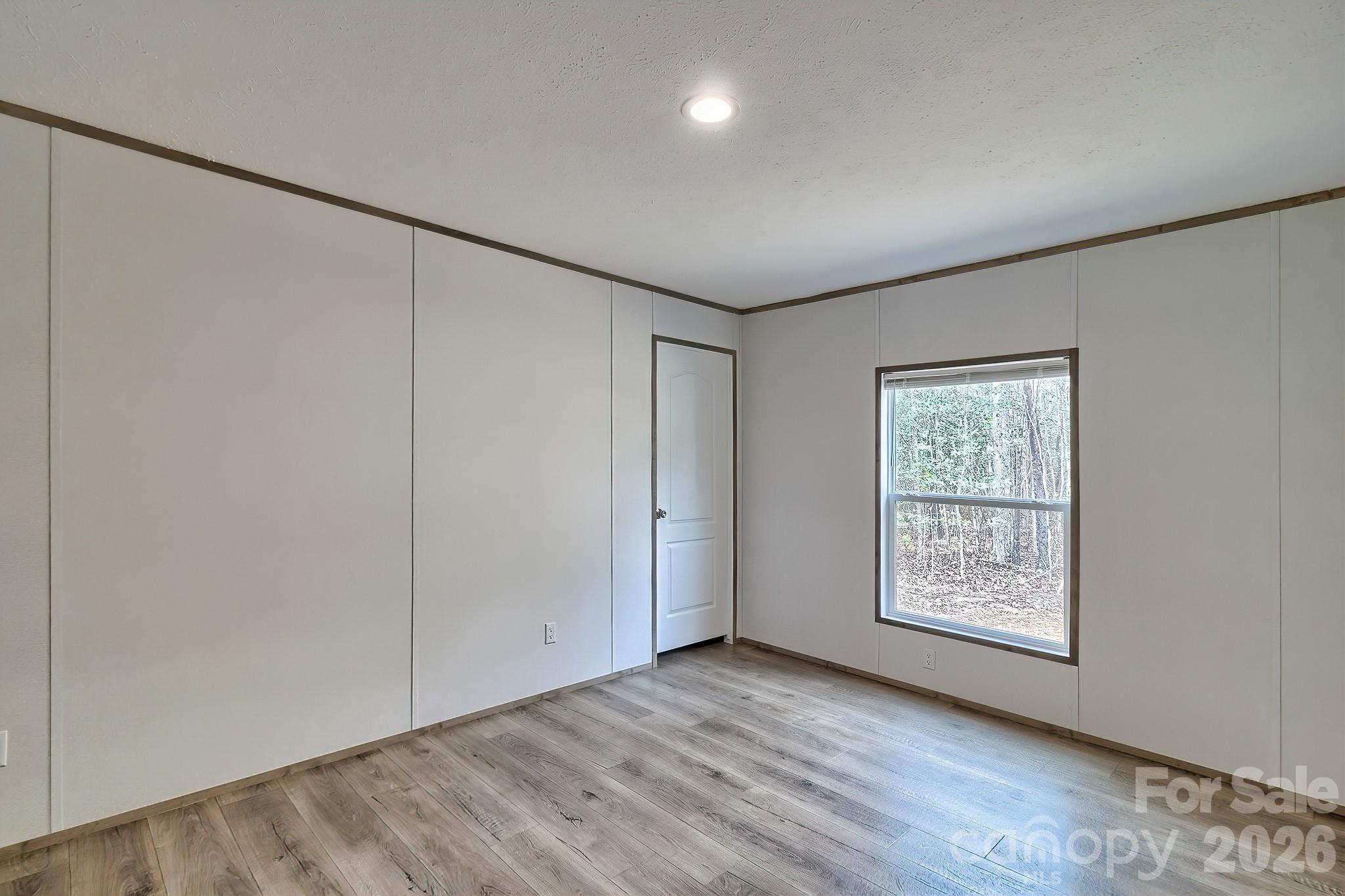 299 Ned Williams Road Kershaw, SC 29067 - Photo 39 of 43 a view of an empty room with a window