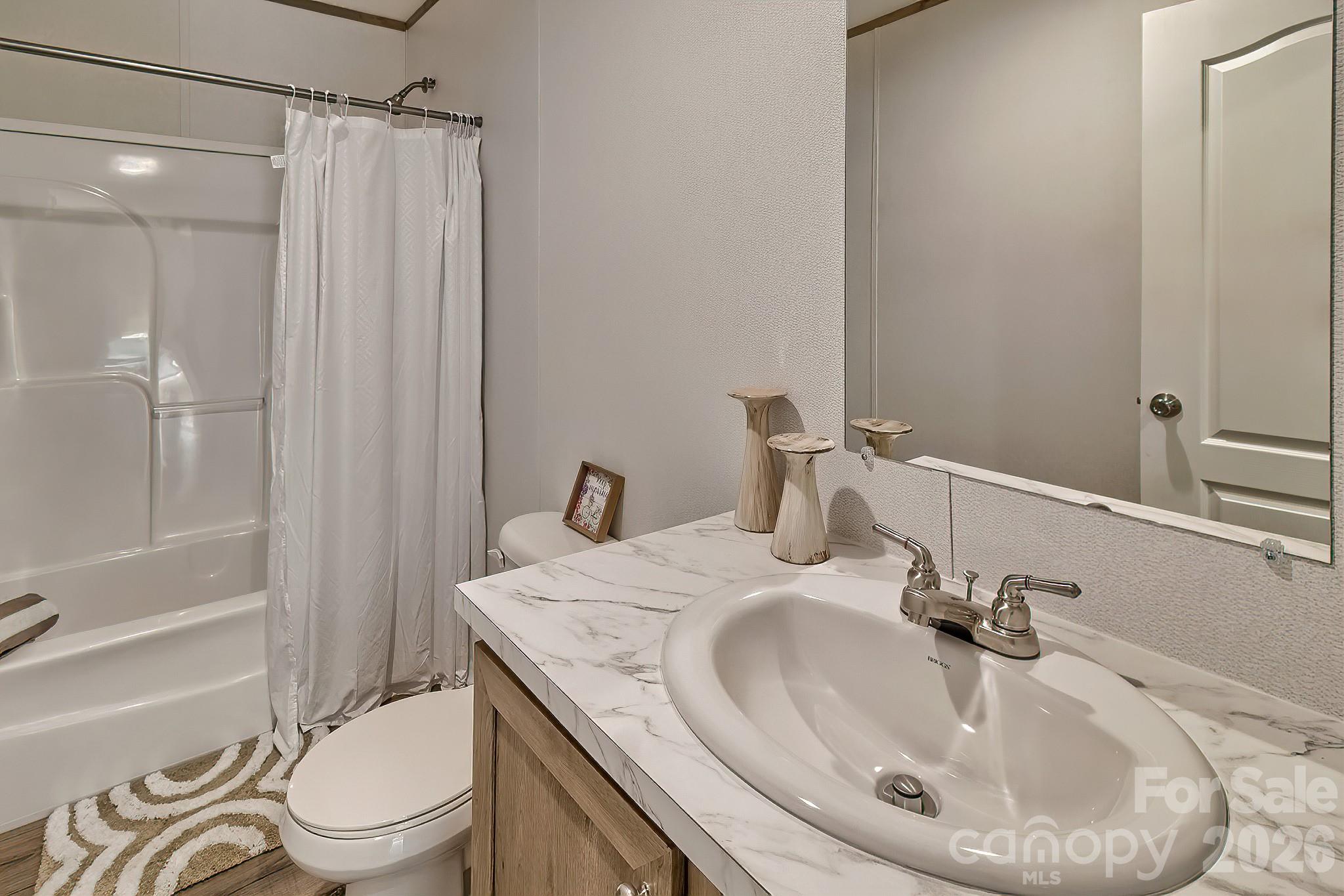 299 Ned Williams Road Kershaw, SC 29067 - Photo 41 of 43 a bathroom with a sink and toilet