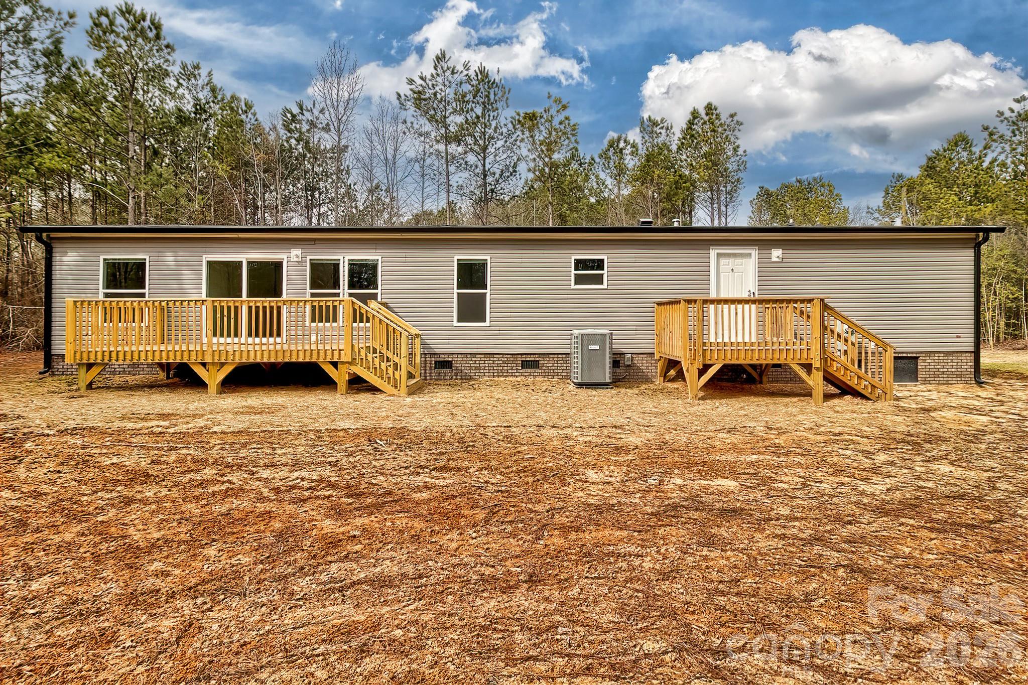 299 Ned Williams Road Kershaw, SC 29067 - Photo 5 of 43 a view of a house with backyard