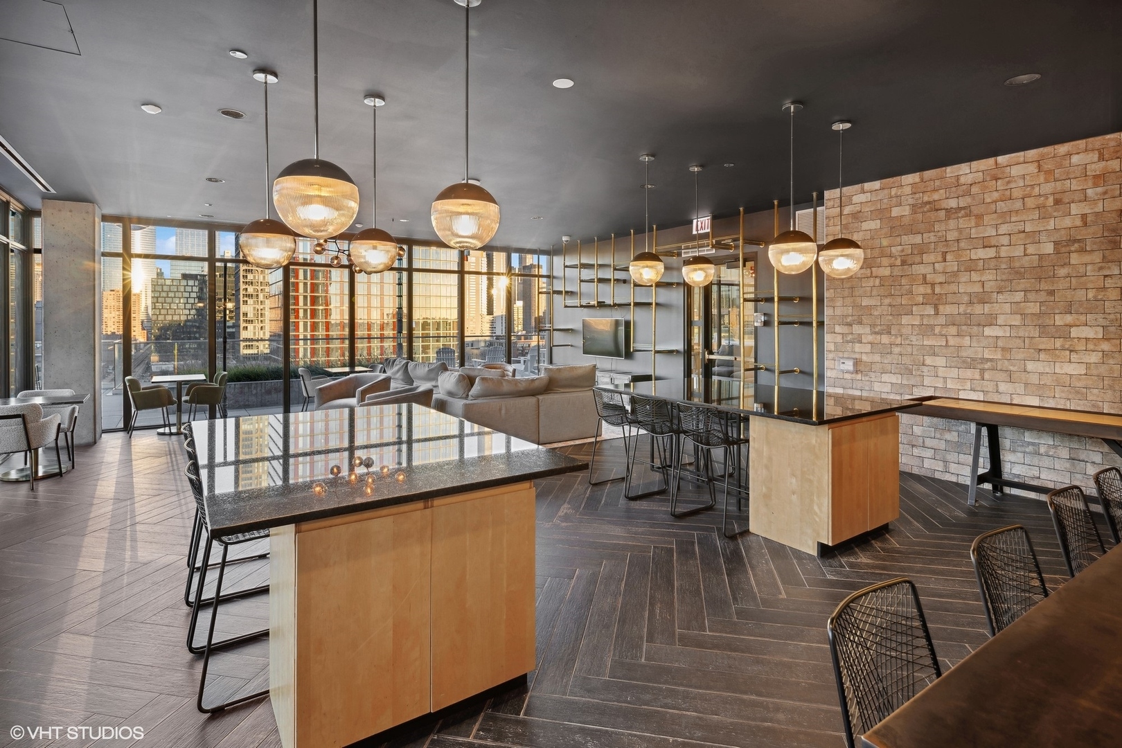 171 North Aberdeen Street, Unit 814 Chicago, IL 60607 - Photo 15 of 22 an open kitchen with wooden floor and large window