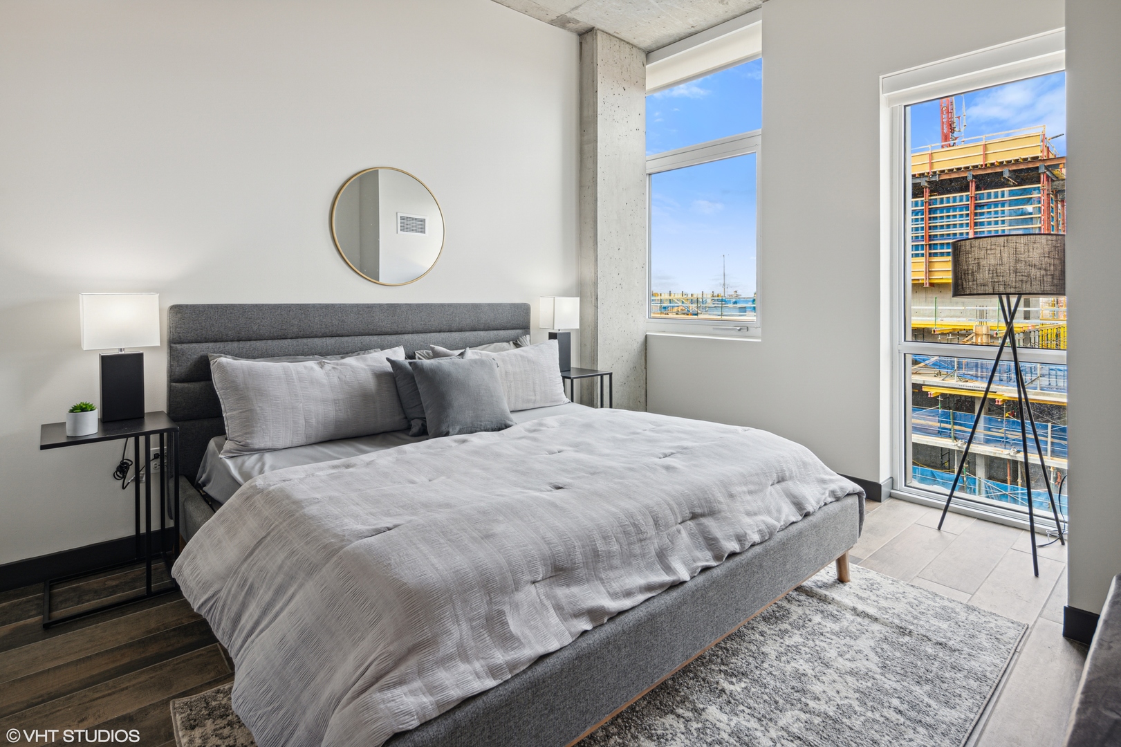 171 North Aberdeen Street, Unit 814 Chicago, IL 60607 - Photo 9 of 22 a bedroom with a bed and window