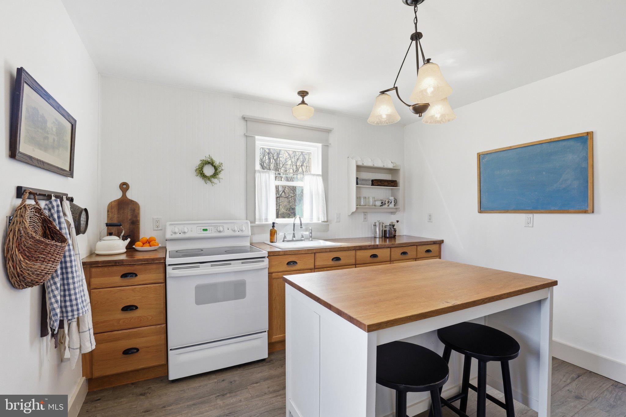 412 Three Bridge Road Newfield, NJ 08344 - Photo 14 of 26 Charming kitchen with modern touches.