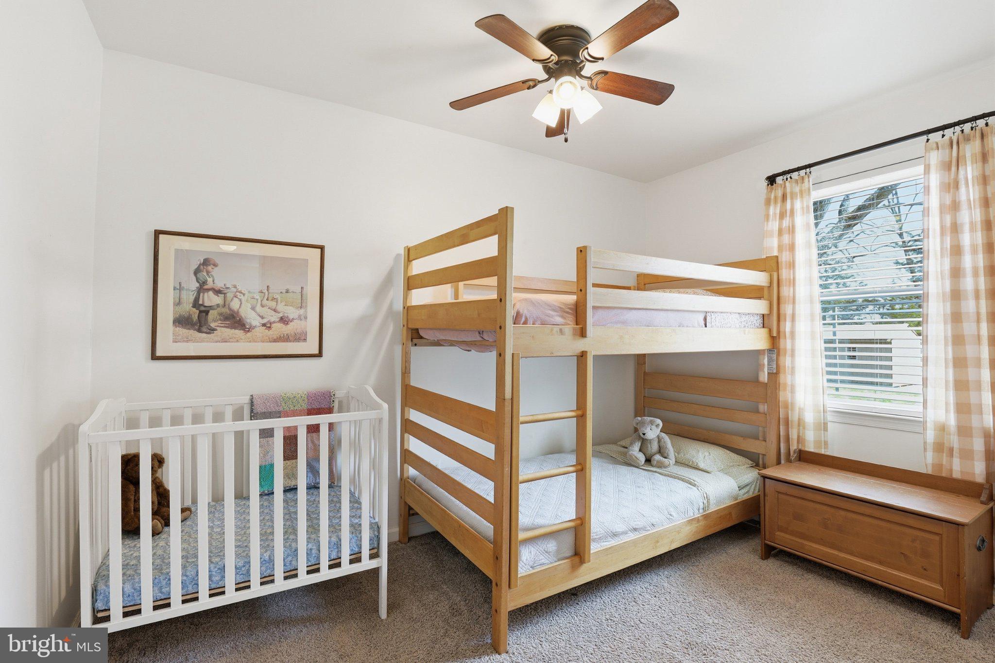 412 Three Bridge Road Newfield, NJ 08344 - Photo 21 of 26 Charming kids' room with cozy beds.