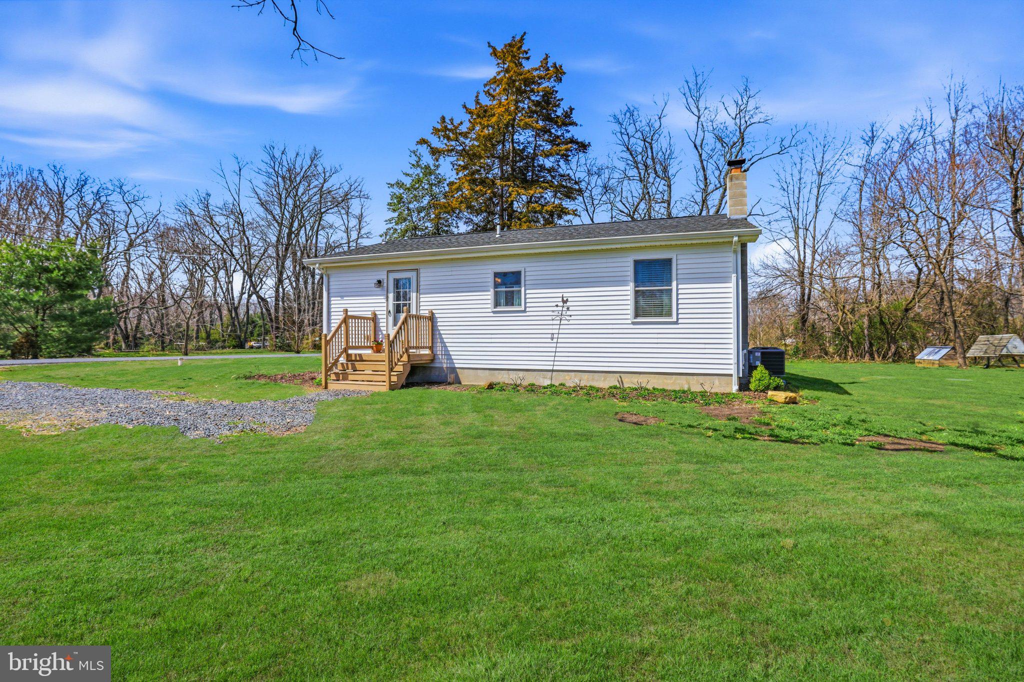412 Three Bridge Road Newfield, NJ 08344 - Photo 6 of 26 Charming home on lush green grounds.