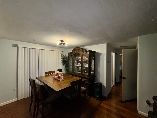 a view of a livingroom with furniture and window