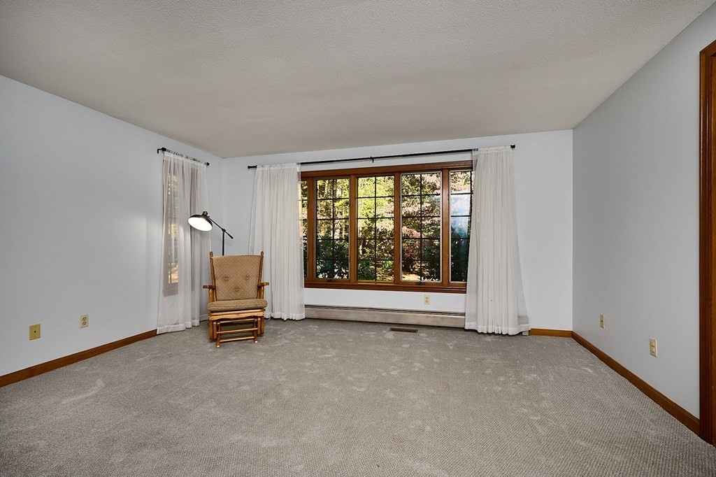 22 Ashley Circle Easthampton, MA 01027 - Photo 24 of 42 a view of a livingroom with a flat screen tv