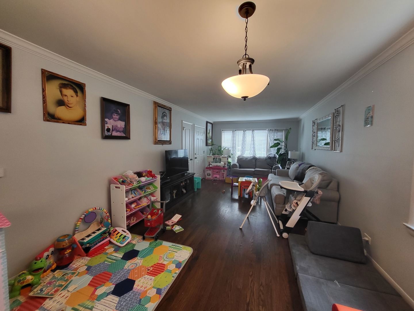 472 Northgate Court Riverside, IL 60546 - Photo 20 of 23 a living room with furniture and a chandelier