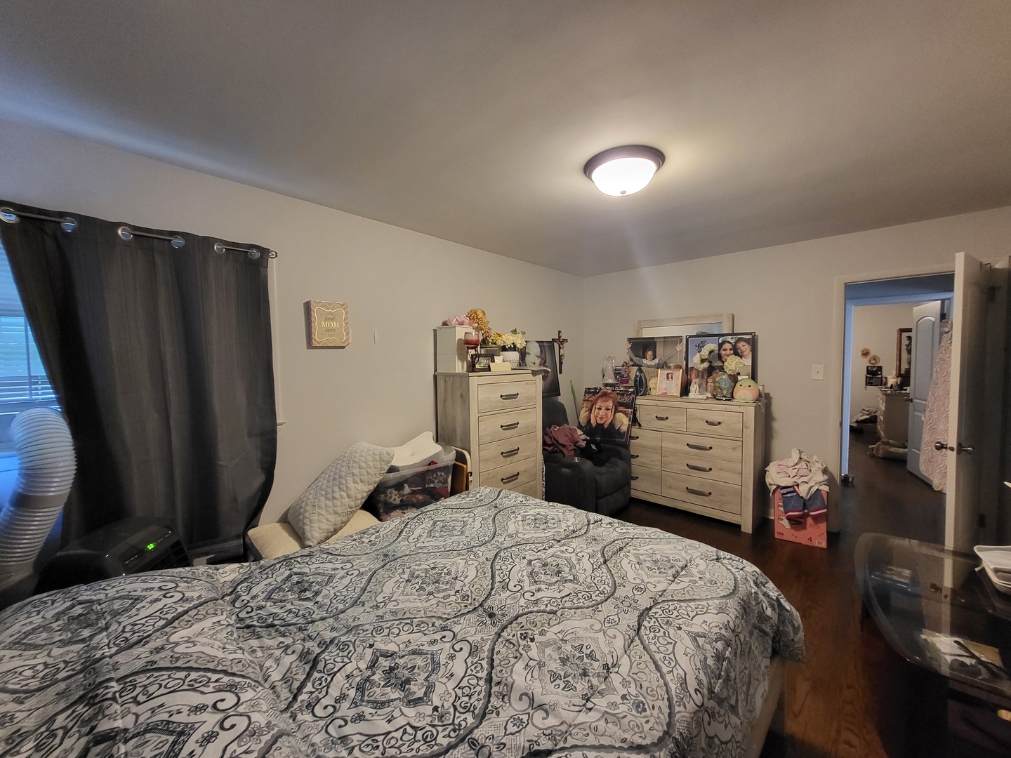 472 Northgate Court Riverside, IL 60546 - Photo 4 of 23 a bedroom with a bed and a large mirror