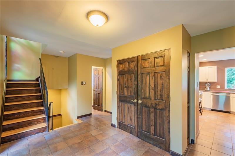 2295 Elmhill Road Pittsburgh, PA 15221 - Photo 3 of 23 Enter through the double-door entry and be dazzled by the beautiful wood and ceramic flooring throughout.