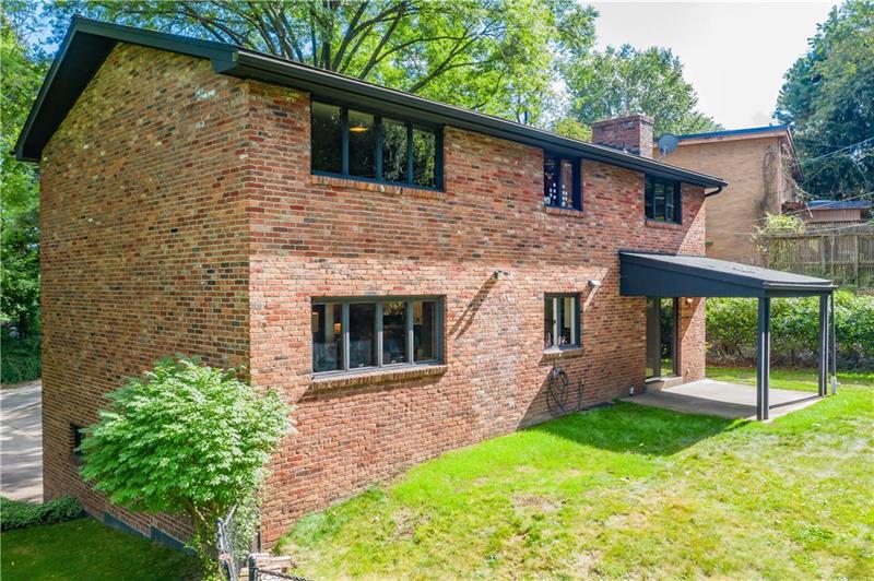 2295 Elmhill Road Pittsburgh, PA 15221 - Photo 22 of 23 The beautiful brick of this home is highlighted from all sides.
