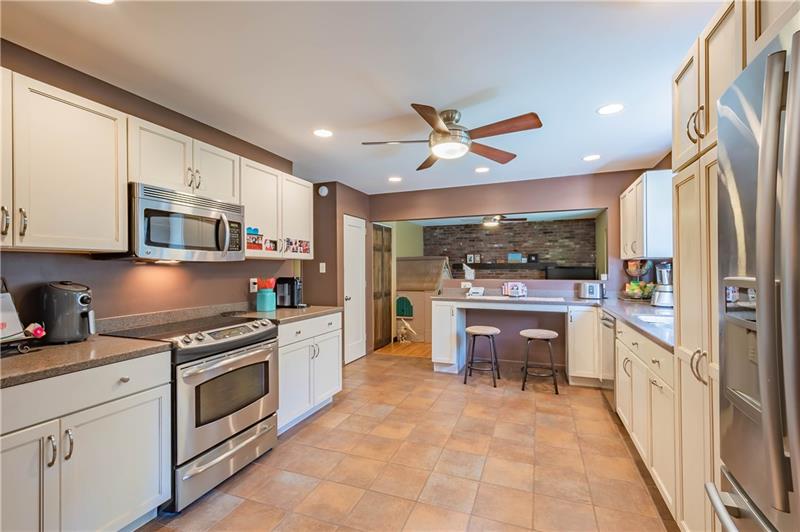 2295 Elmhill Road Pittsburgh, PA 15221 - Photo 8 of 23 This completely updated kitchen is any chef's dream. Complete with quartz countertops, stainless steel appliances and abundant cabinets.