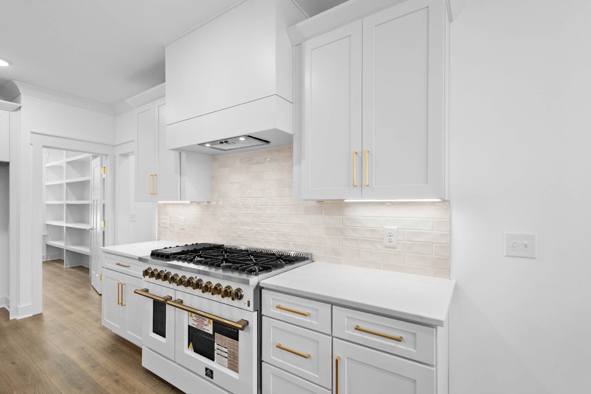 112 Stoneybrook Road Columbia, TN 38401 - Photo 20 of 47 a kitchen with white cabinets and appliances