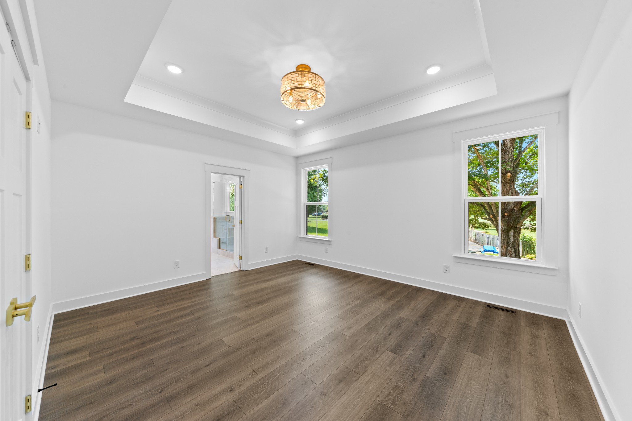 112 Stoneybrook Road Columbia, TN 38401 - Photo 24 of 47 a view of an empty room with window and wooden floor