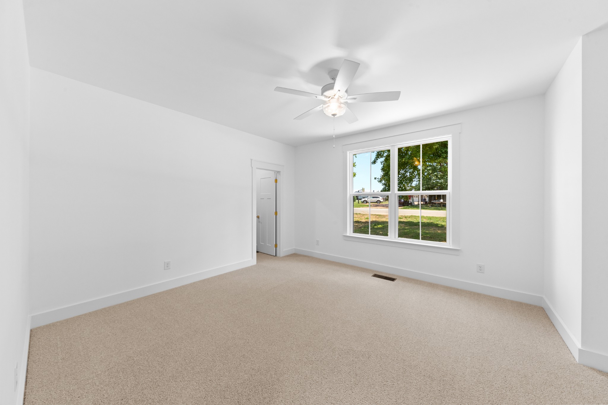 112 Stoneybrook Road Columbia, TN 38401 - Photo 33 of 47 an empty room with a window and a ceiling fan
