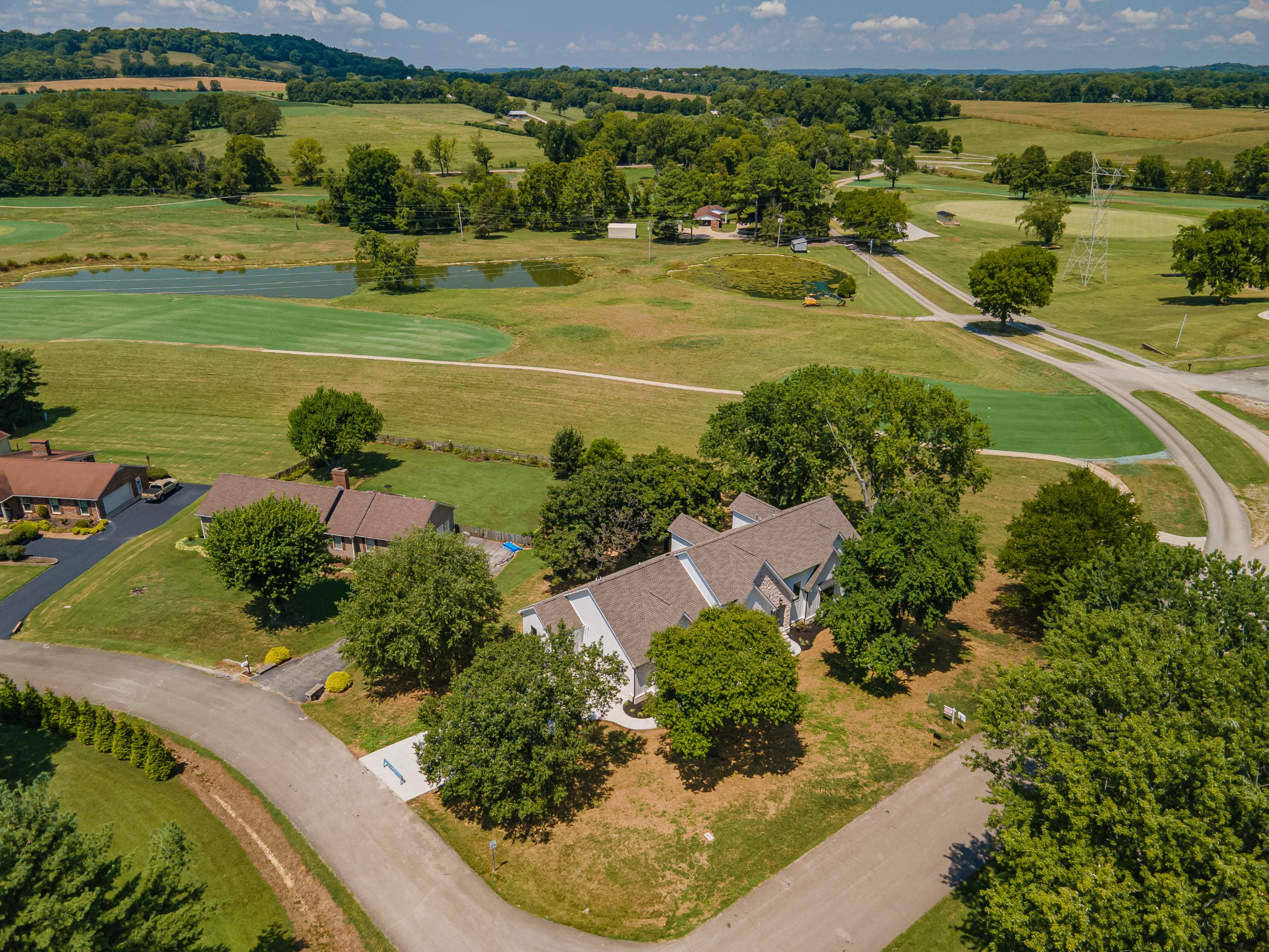 112 Stoneybrook Road Columbia, TN 38401 - Photo 9 of 47 an aerial view of a houses with outdoor space and tennis court