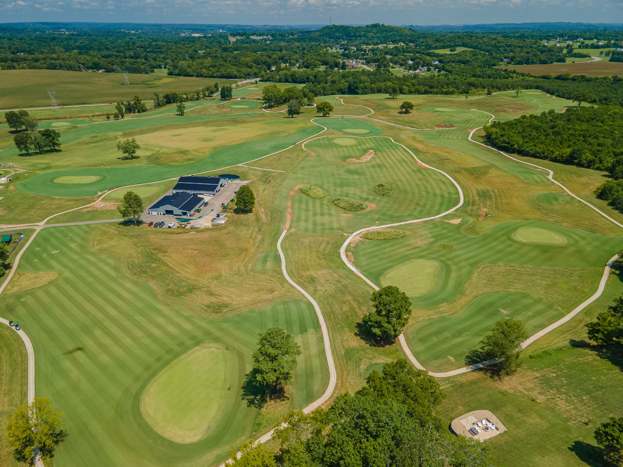 112 Stoneybrook Road Columbia, TN 38401 - Photo 10 of 47 an aerial view of a golf course with a big yard