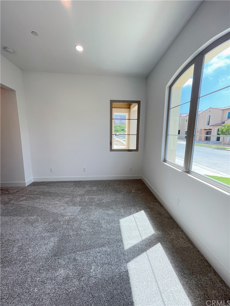 215 Sutters Mill Irvine, CA 92602 - Photo 12 of 57 a view of an empty room with a window