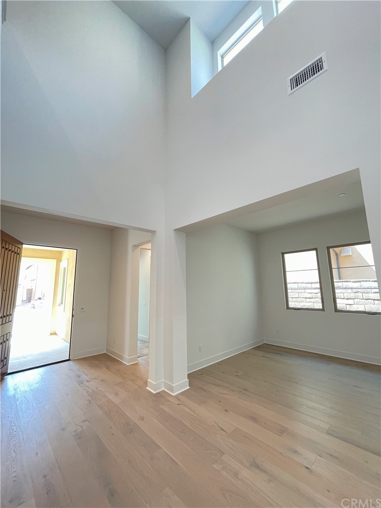 215 Sutters Mill Irvine, CA 92602 - Photo 16 of 57 an empty room with windows