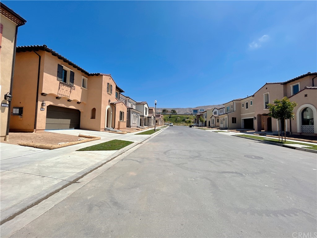 215 Sutters Mill Irvine, CA 92602 - Photo 2 of 57 a view of building with large trees