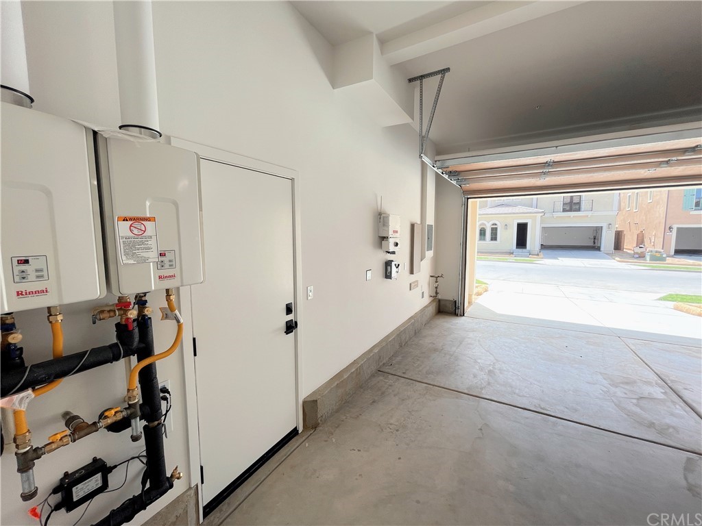 215 Sutters Mill Irvine, CA 92602 - Photo 22 of 57 a view of a hallway with workspace and a window