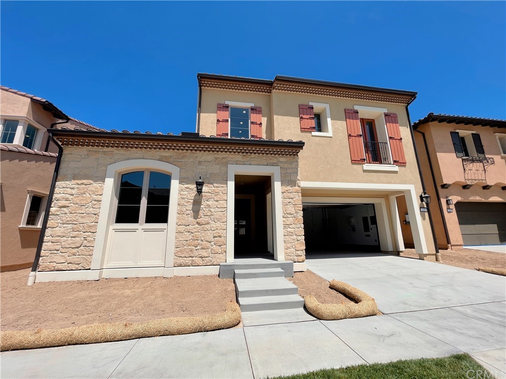 215 Sutters Mill Irvine, CA 92602 - Photo 3 of 57 a view of a building with car parked