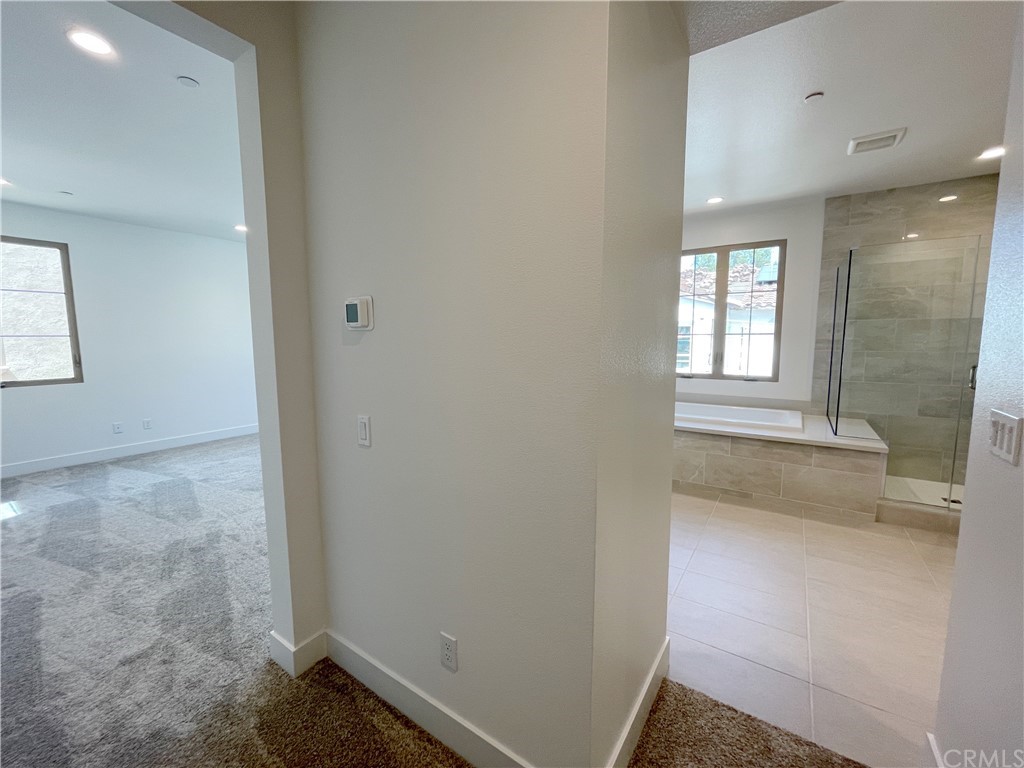 215 Sutters Mill Irvine, CA 92602 - Photo 32 of 57 an empty room with windows and closet