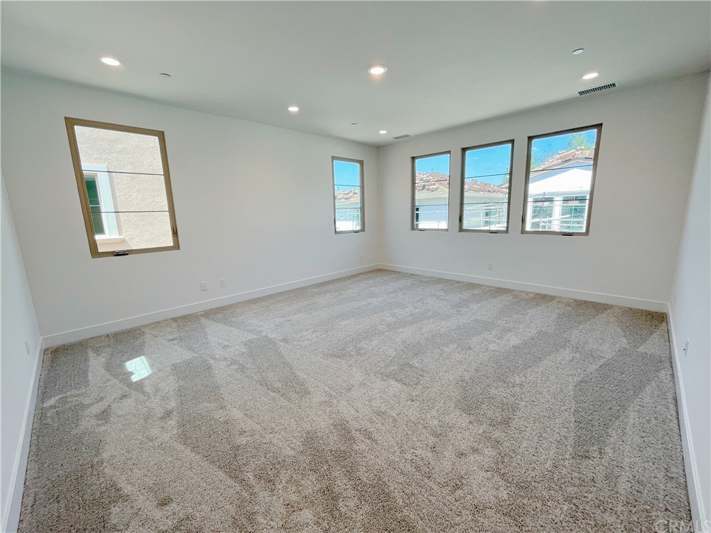 215 Sutters Mill Irvine, CA 92602 - Photo 33 of 57 an empty room with windows