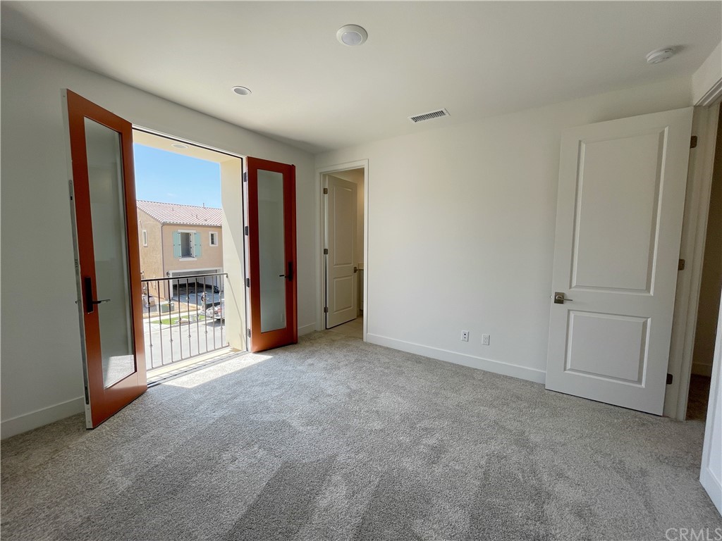 215 Sutters Mill Irvine, CA 92602 - Photo 39 of 57 a view of empty room with floor to ceiling window