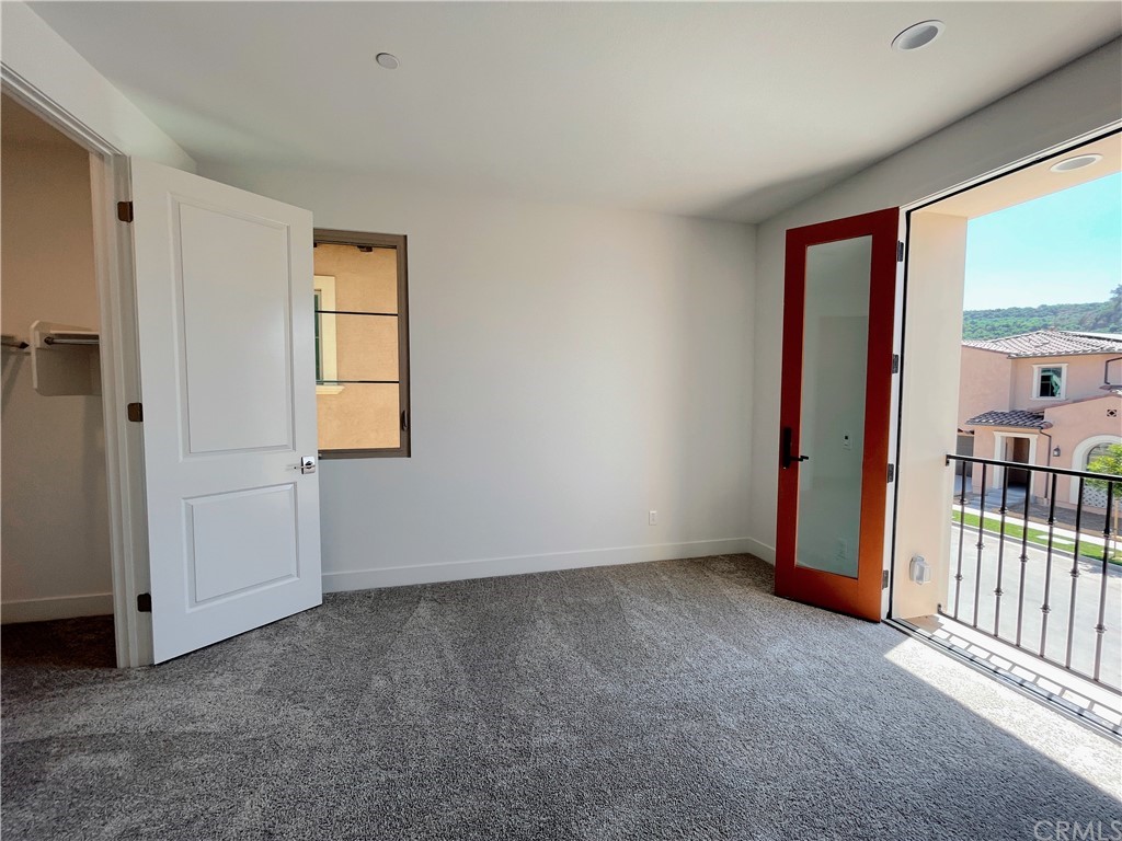 215 Sutters Mill Irvine, CA 92602 - Photo 40 of 57 an empty room with windows