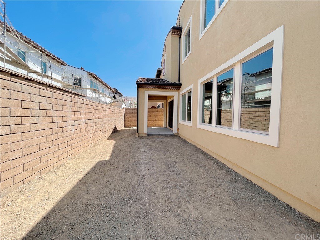 215 Sutters Mill Irvine, CA 92602 - Photo 50 of 57 a view of a house with a garage