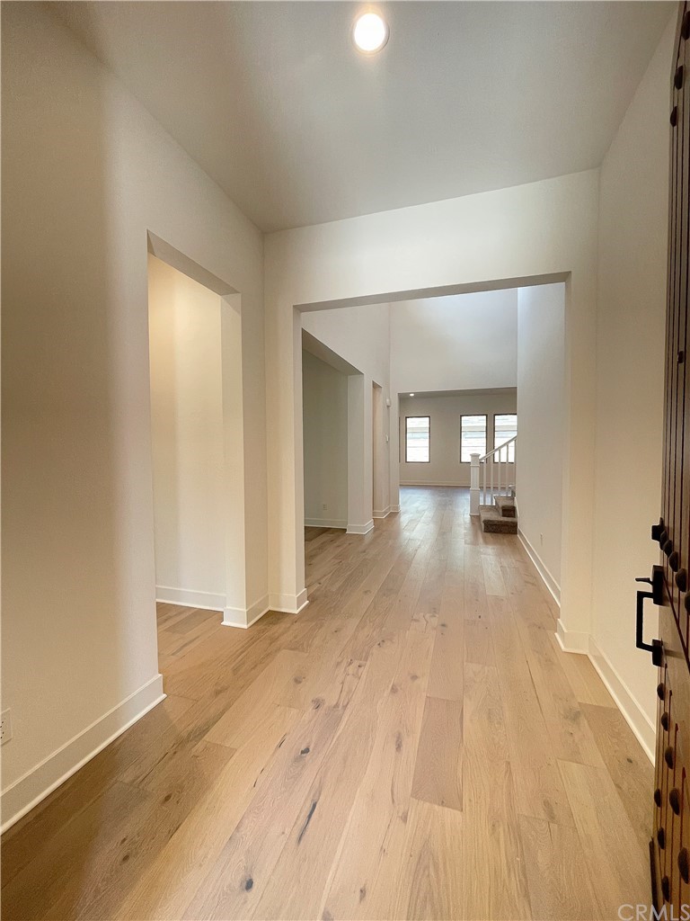 215 Sutters Mill Irvine, CA 92602 - Photo 8 of 57 a view of a room with wooden floor