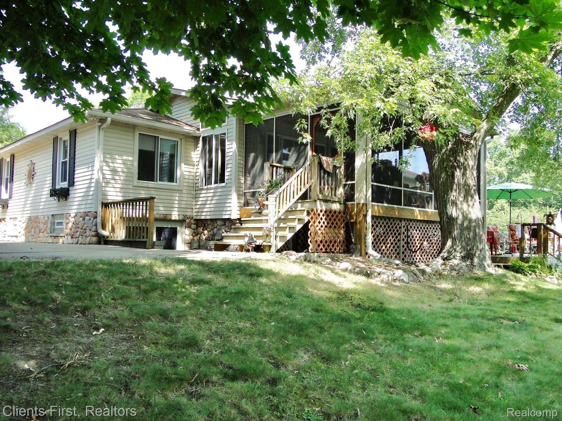 2146 Hampton Road White Lake, MI 48386 - Photo 9 of 59 Walk out basement, entry to lovely screened in deck!