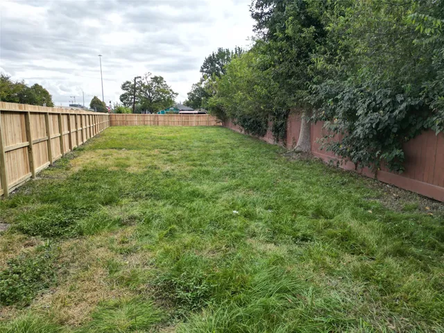 a view of a backyard with a garden
