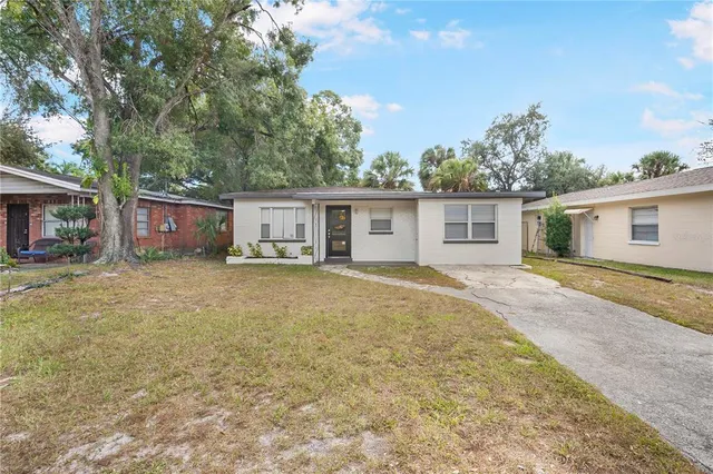 front view of a house with a yard