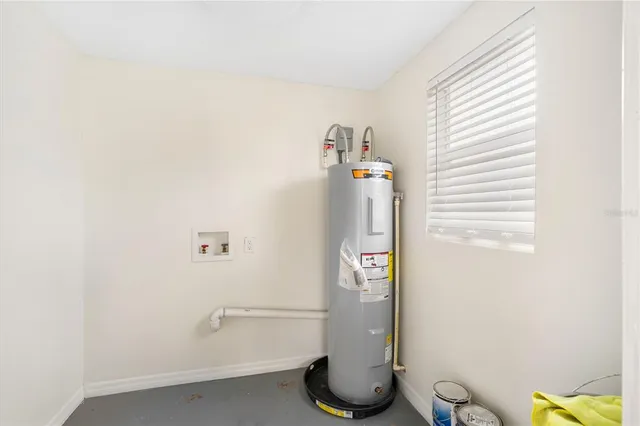 a bathroom with a shower and a sink