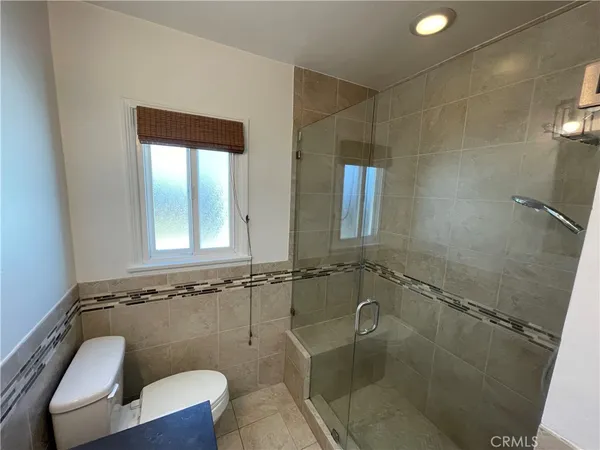 a bathroom with a bathtub a toilet and a sink