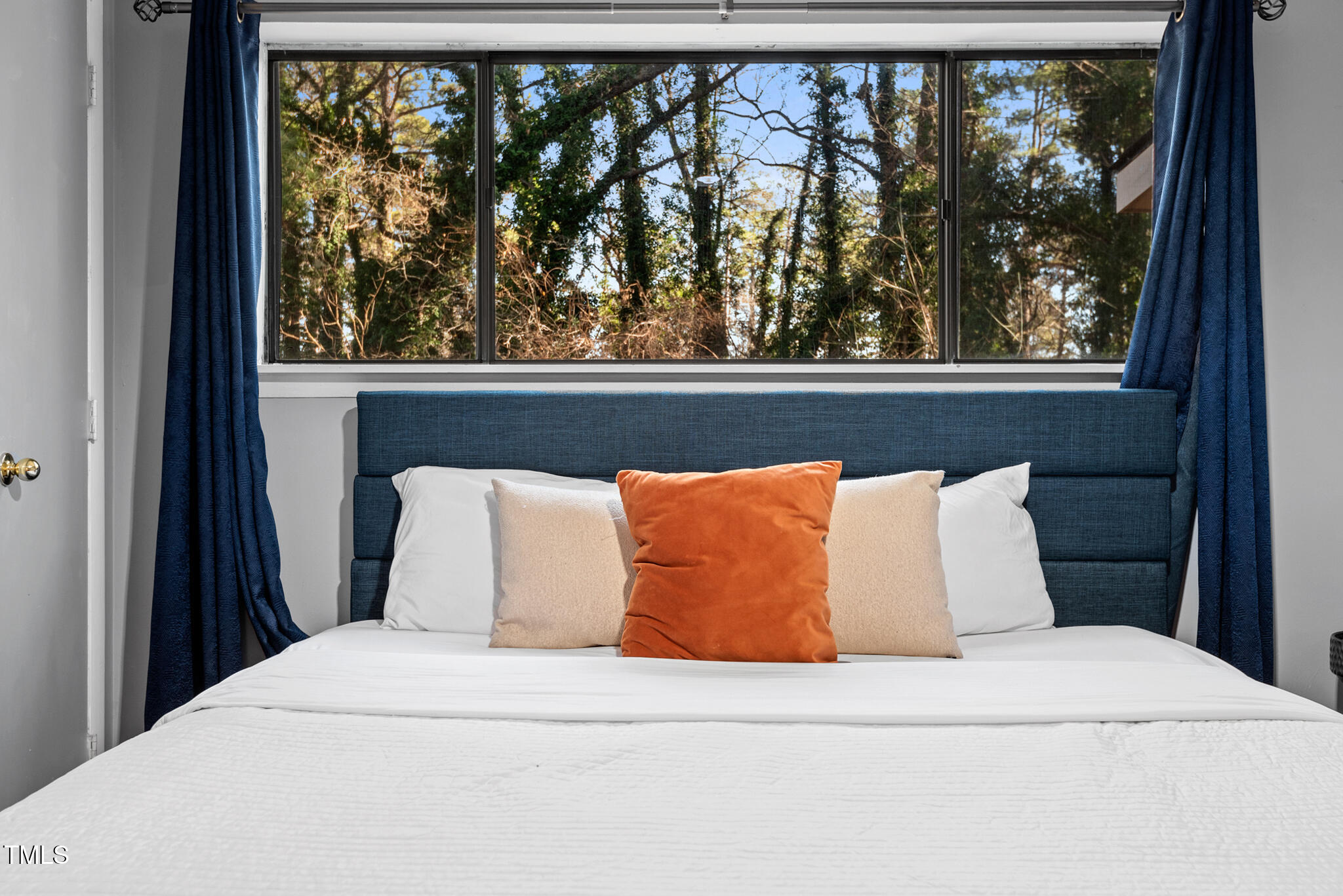 5084 Flint Ridge Place Raleigh, NC 27609 - Photo 13 of 23 a close view of a bed in a room
