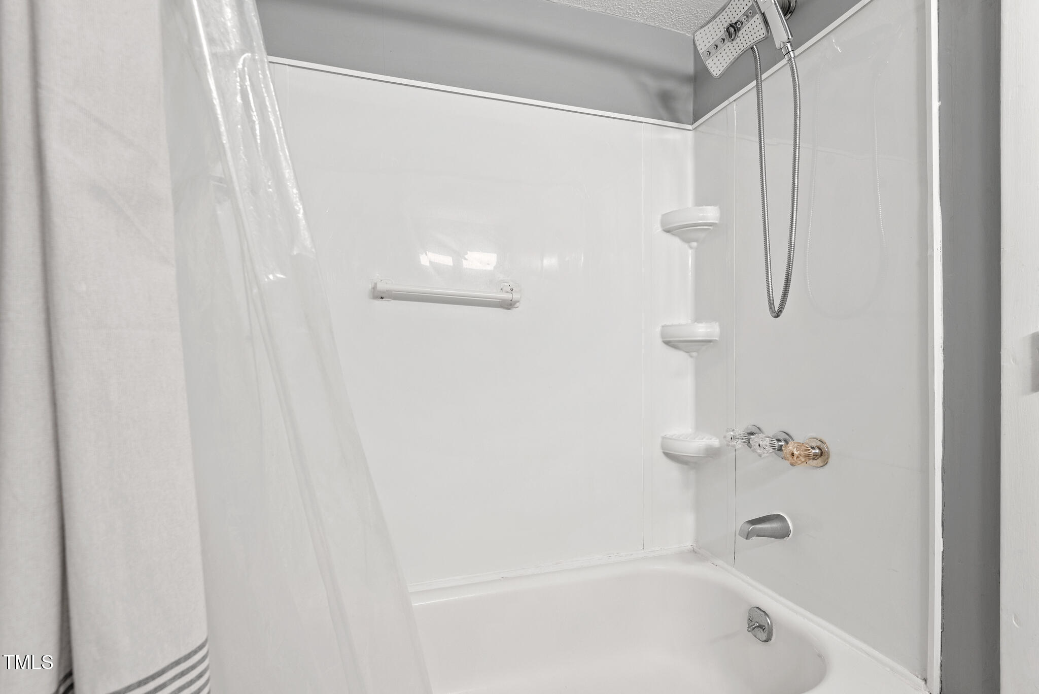 5084 Flint Ridge Place Raleigh, NC 27609 - Photo 15 of 23 a bathroom with a shower