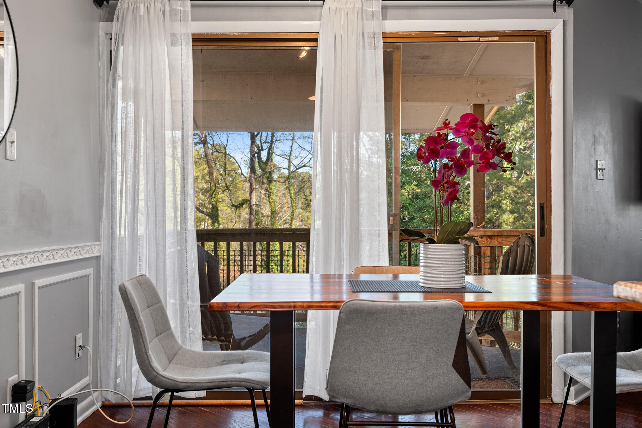 5084 Flint Ridge Place Raleigh, NC 27609 - Photo 7 of 23 a view of a dining room with furniture window and wooden floor