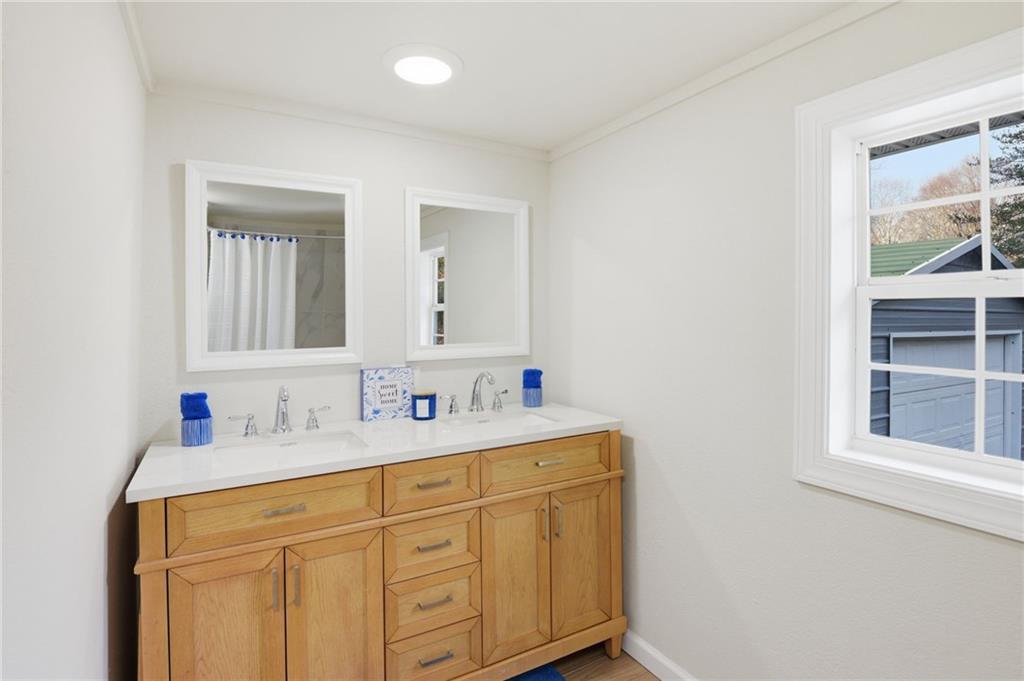 1780 Wynn Lake Road Alto, GA 30510 - Photo 16 of 30 a bathroom with a sink and a mirror