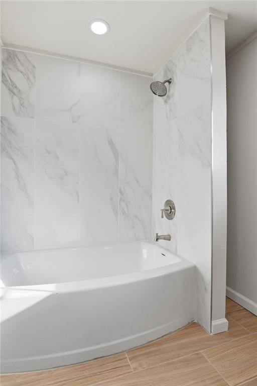 1780 Wynn Lake Road Alto, GA 30510 - Photo 21 of 30 a bathroom with a bathtub