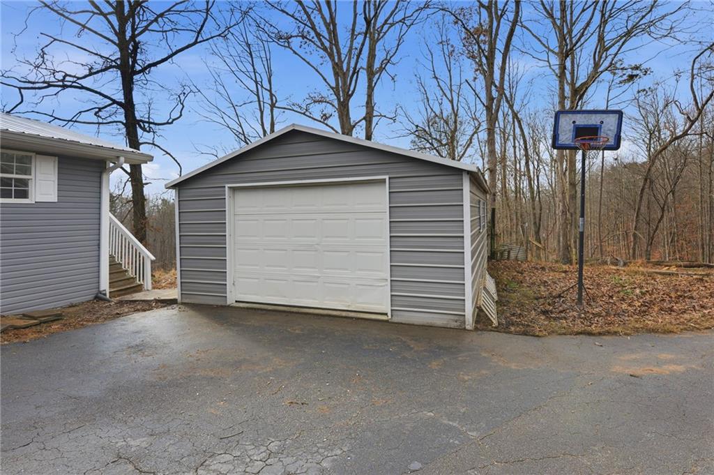 1780 Wynn Lake Road Alto, GA 30510 - Photo 25 of 30 a front view of a house with a yard