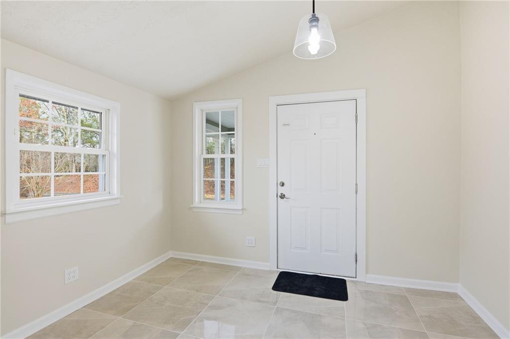 1780 Wynn Lake Road Alto, GA 30510 - Photo 4 of 30 an empty room with windows