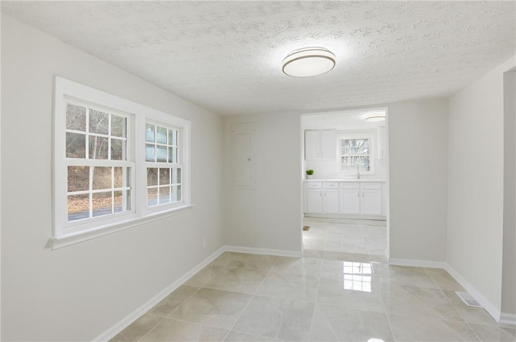 1780 Wynn Lake Road Alto, GA 30510 - Photo 9 of 30 an empty room with windows
