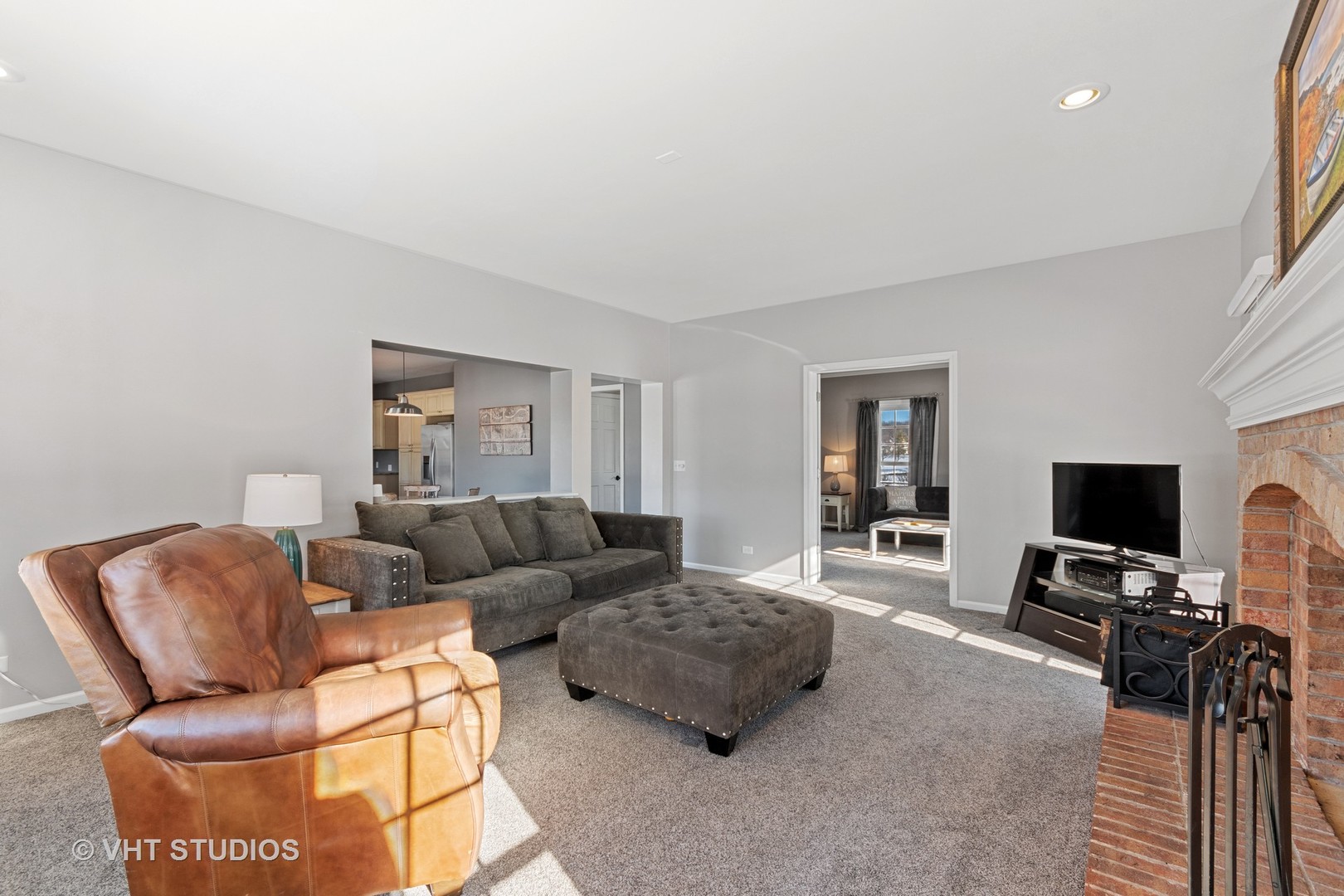 5N200 Grey Barn Road St. Charles, IL 60175 - Photo 8 of 42 a living room with furniture and a flat screen tv