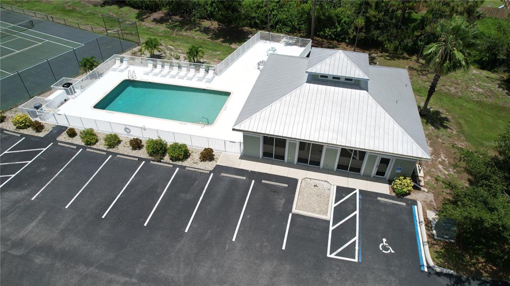 8050 Memory Lane, Unit 101 Rotonda West, FL 33947 - Photo 16 of 16 a balcony with table and chairs