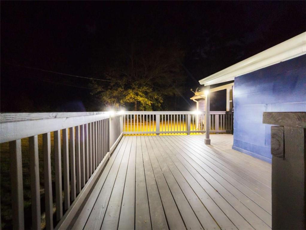 6557 Woodrow Road Lithonia, GA 30038 - Photo 16 of 17 a view of deck with wooden floor and outdoor space