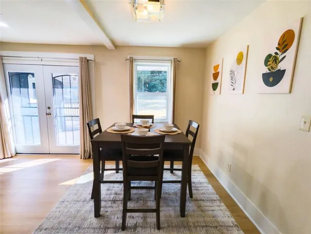 a view of a dining room with furniture